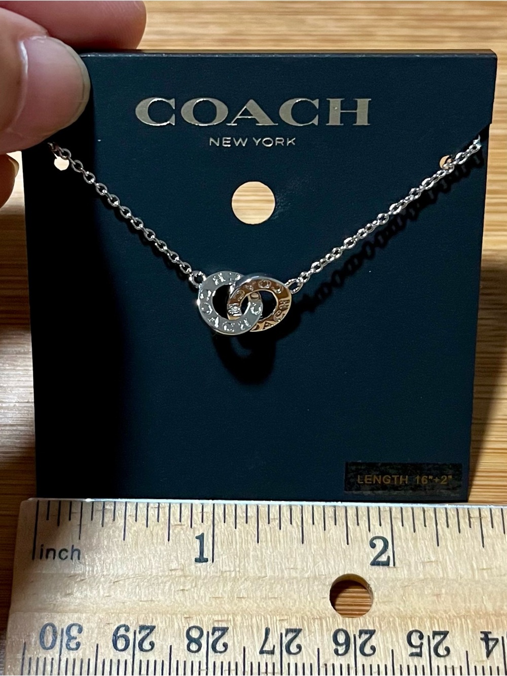 Coach Silver Tone Double Interlocking Ring Charm Necklace w/ subtle engraving